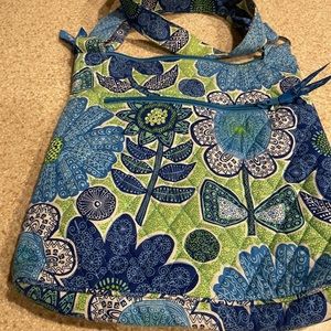 Vera Bradley cross body. Beautiful blue.  Never used. Lightweight. Adorable on.